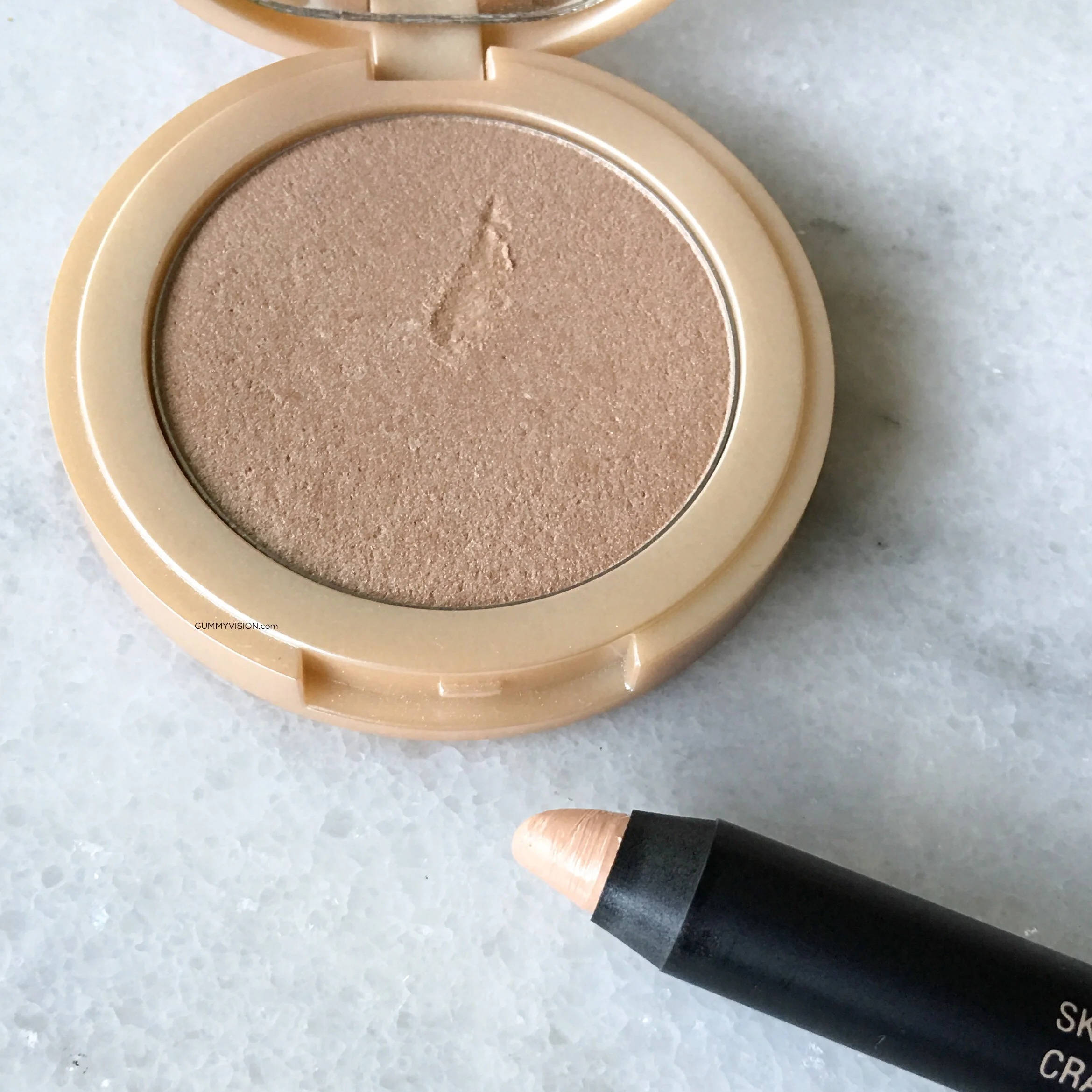 NUDESTIX Skin Glossing Pencil&nbsp;and the Tarte Amazonian Clay 12-hr Highlighter in Exposed Highlight&nbsp;